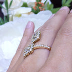 Yellow Gold Round and Baguette Diamond Bypass Ring