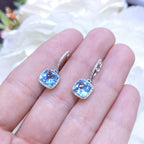 4.01CT Blue Topaz and Diamond Halo Dangling Earrings in 14K White Gold (etsy image id: 3135237812)