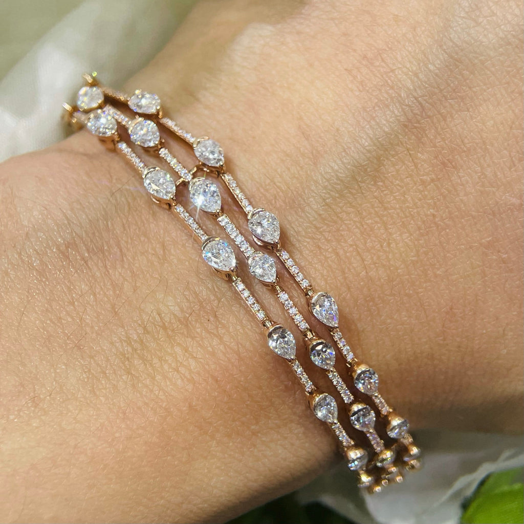 Rounds and Pear  5.75ct Diamonds with Prong Setting in 14K Rose Gold Tennis Bracelet (etsy image id: 3981901225)