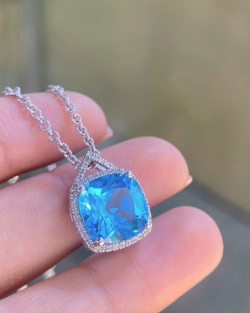 14K White Gold 5.50ct Blue Topaz Pendant in 0.30ct in Diamonds (etsy image id: 4093962872)