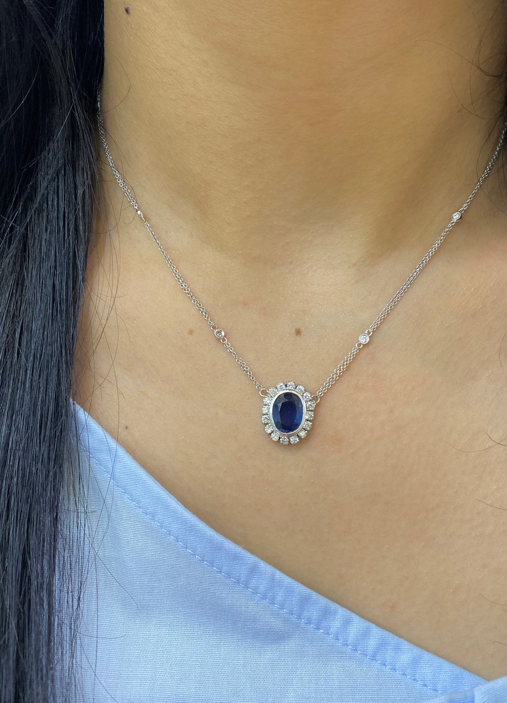 Oval blue sapphire with diamond pendant. (etsy image id: 4094097300)
