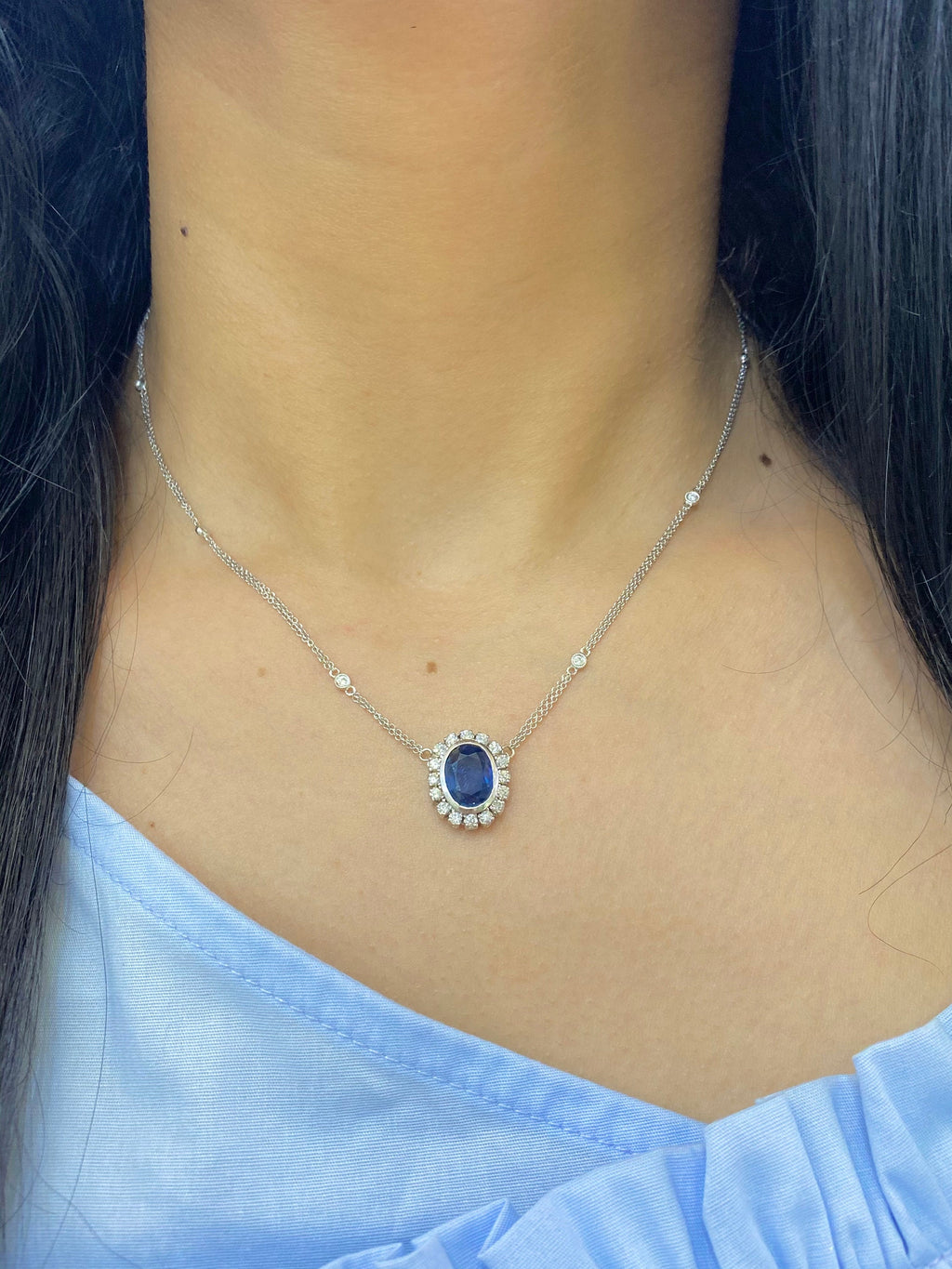 Oval blue sapphire with diamond pendant. (etsy image id: 4094097786)