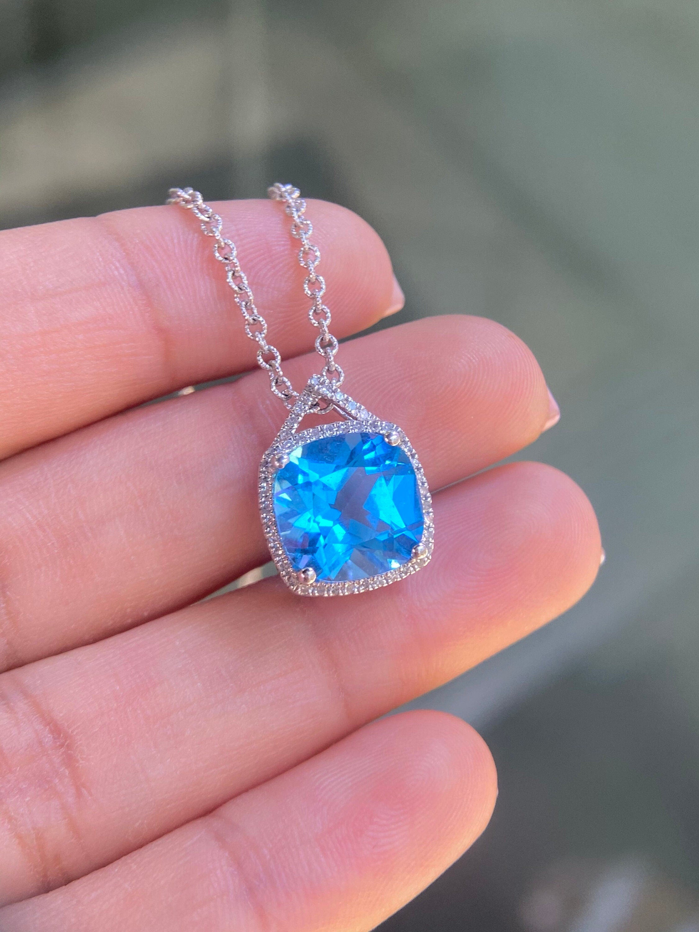 14K White Gold 5.50ct Blue Topaz Pendant in 0.30ct in Diamonds (etsy image id: 4141617585)