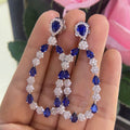 18K White Gold Earrings with Pear Shape Blue Sapphires and Natural Brilliant Round Diamonds. 8.05ct Natural Sapphires & 3.24ct in Diamonds. (etsy image id: 4901671422)