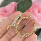 14K Yellow Gold Twist Oval Hoop Earrings 2.75ct in Natural Diamonds. (etsy image id: 4961279713)