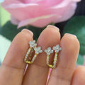 14K Yellow Gold Little Flower Huggie Style Earrings with 0.35ct in Diamonds. (etsy image id: 5075975311)