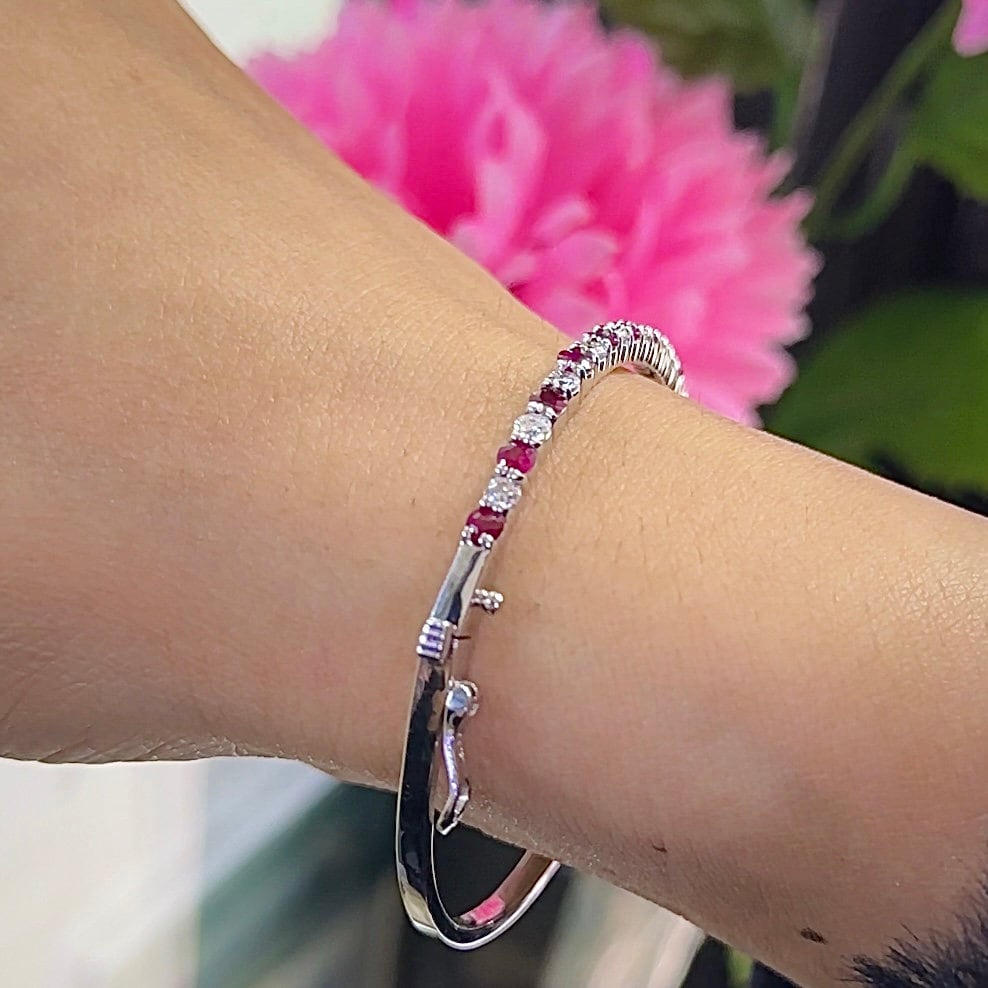 14K White Gold Ruby Diamond Bangle Bracelet with 1.45ct rd cut Ruby's and 0.90ct rd cut Natural Diamonds. (etsy image id: 5724293930)