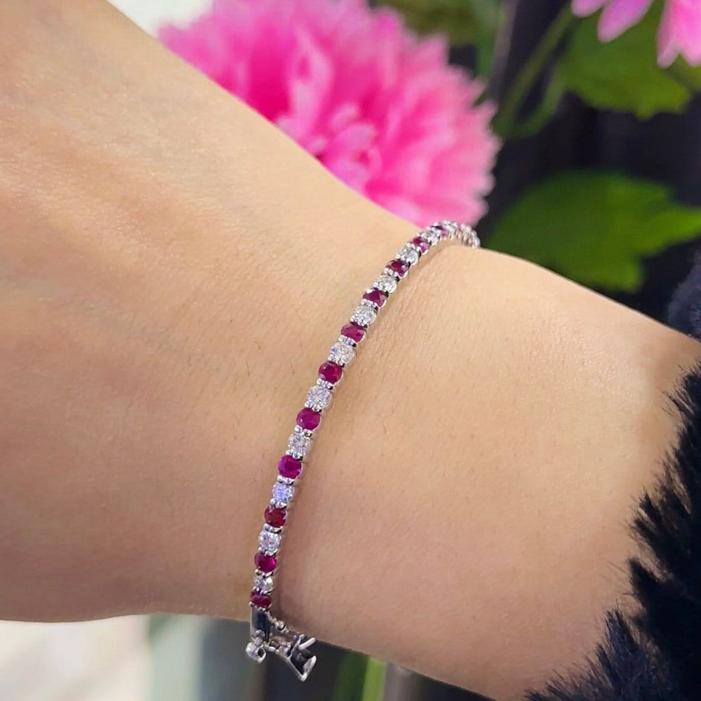 14K White Gold Ruby Diamond Bangle Bracelet with 1.45ct rd cut Ruby's and 0.90ct rd cut Natural Diamonds. (etsy image id: 5772365031)