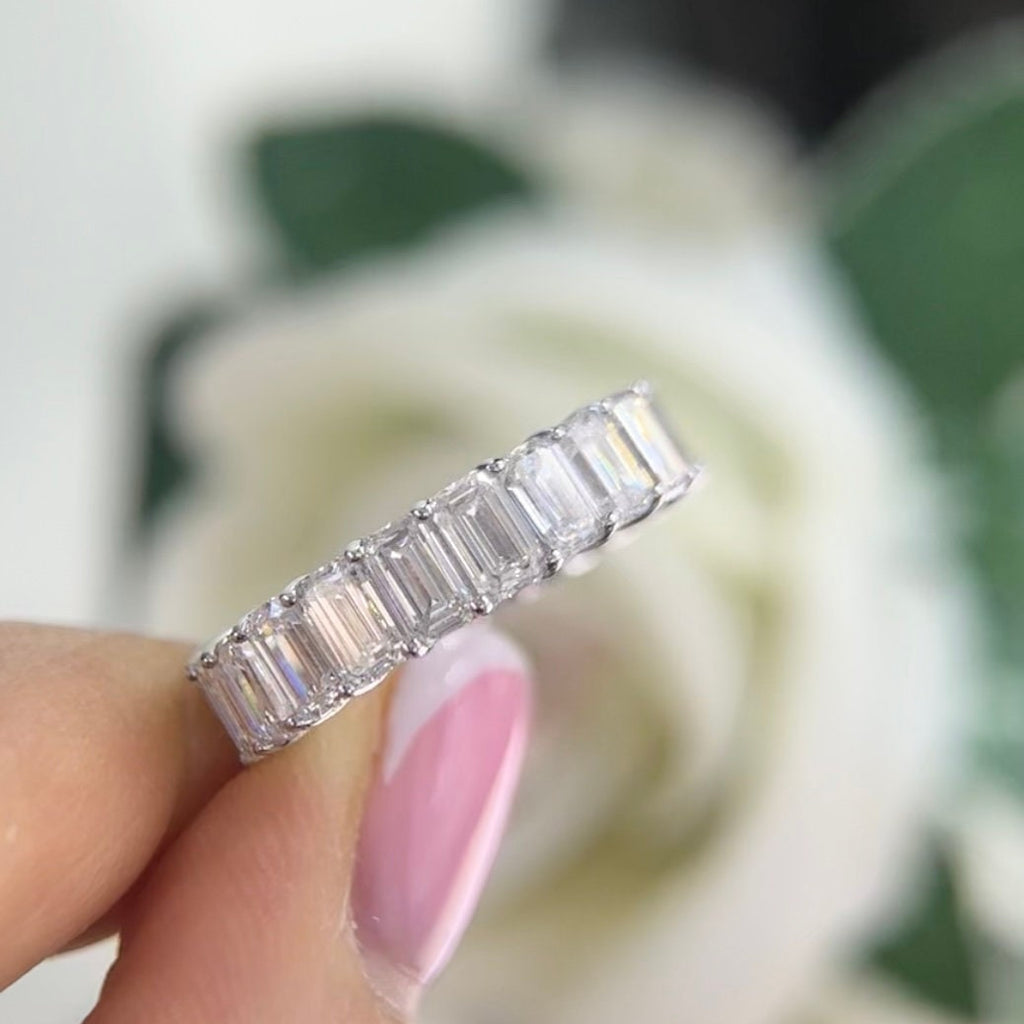 14Kt White Gold eternity band with 6.65ct total in Emerald cut Lab Grown Diamonds. WB588 ISJJ (etsy image id: 5916554592)