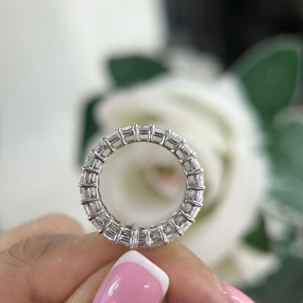 14Kt White Gold eternity band with 6.65ct total in Emerald cut Lab Grown Diamonds. WB588 ISJJ (etsy image id: 5964640117)