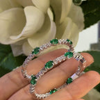 Large 14k White Gold Hoop Earrings with Oval Lab Emeralds and Round Lab Diamonds (etsy image id: 6686700932)