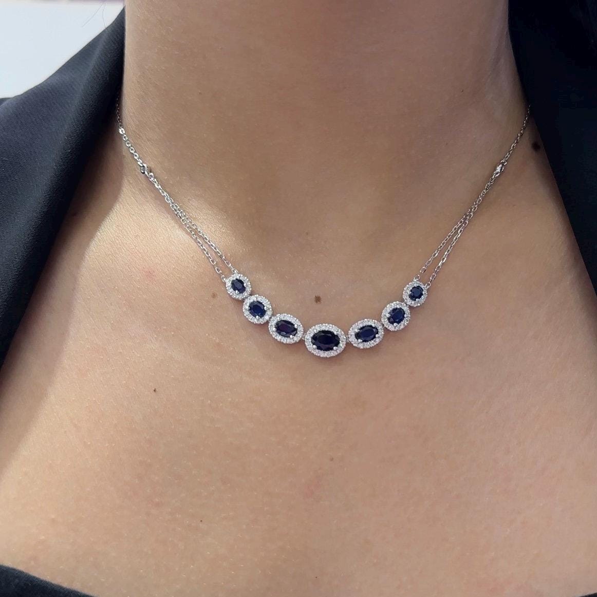 Woman wearing Diamond By The Yard double chain blue sapphire and diamonds necklace. __etsy:6704995610