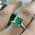 White Gold Compressed Green Emerald Ring Set in Prong Setting with Diamonds on Band (etsy image id: 6730944916)