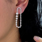 White Gold Dangling Drop Diamond Earrings Featuring Round Cut Diamonds (etsy image id: 6734740567)