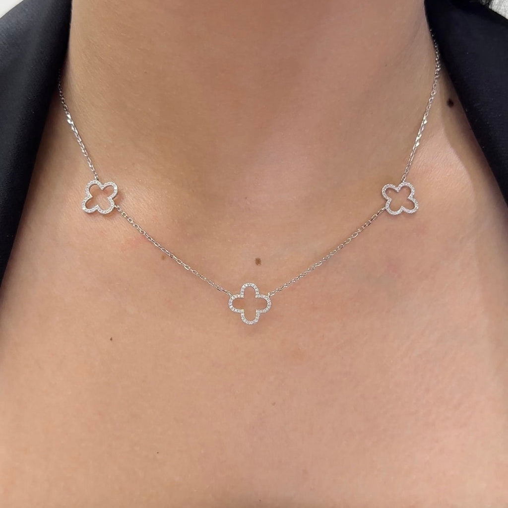 Woman wearing white gold three diamond clover necklace (etsy image id: 6752807831)