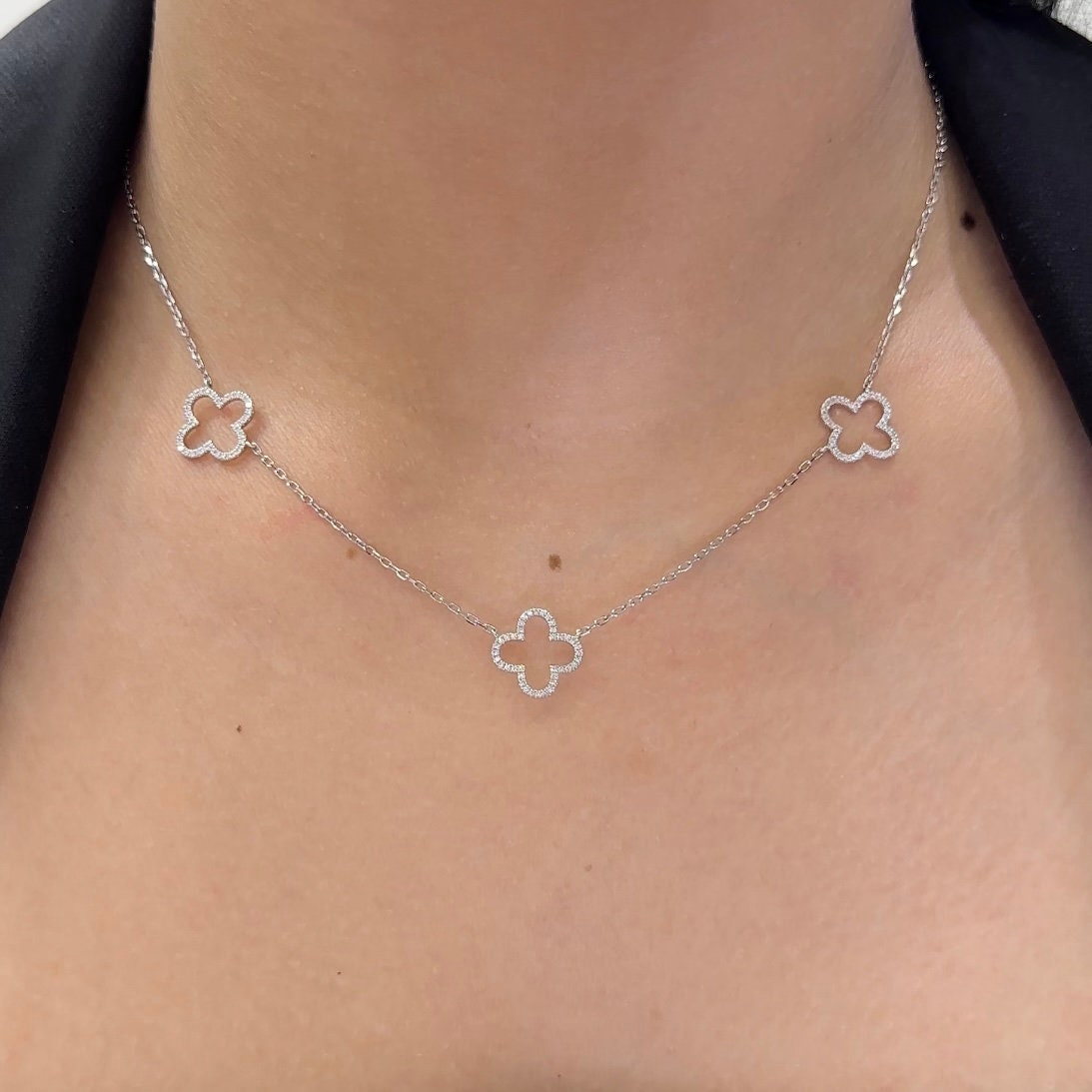 Woman wearing white gold three diamond clover necklace (etsy image id: 6752807831)