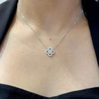 Woman wearing white gold diamond clover pendant necklace (etsy image id: 6753132427)