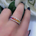 Woman wearing multi color sapphire and diamond ring in rose gold (etsy image id: 6753336233)