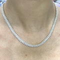 Woman wearing yellow gold three row tennis necklace. (etsy image id: 6768115118)