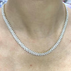 Woman wearing yellow gold three row tennis necklace. (etsy image id: 6768115118)