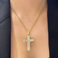 Woman wearing yellow gold chain with a yellow gold diamond cross (etsy image id: 6776598345)
