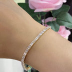 Lustrous Yellow Gold Emerald Cut Diamond East West Tennis Bracelet (etsy image id: 6833475506)