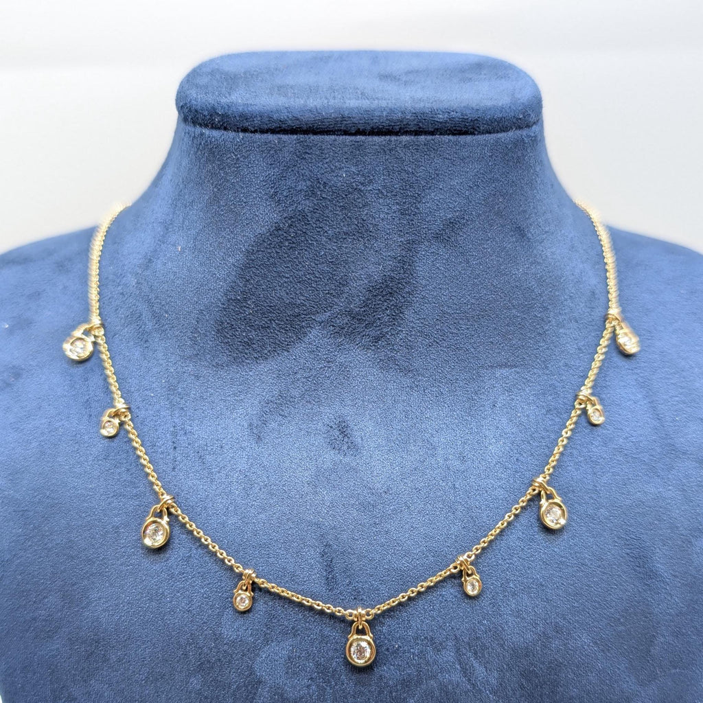 18k yellow gold diamond by the yard necklace with 9 round cut diamonds (etsy image id: 6898290319)