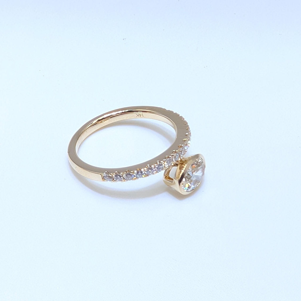 Yellow Gold Diamond Band Ring with Oval Cut Diamond (etsy image id: 6917382974)