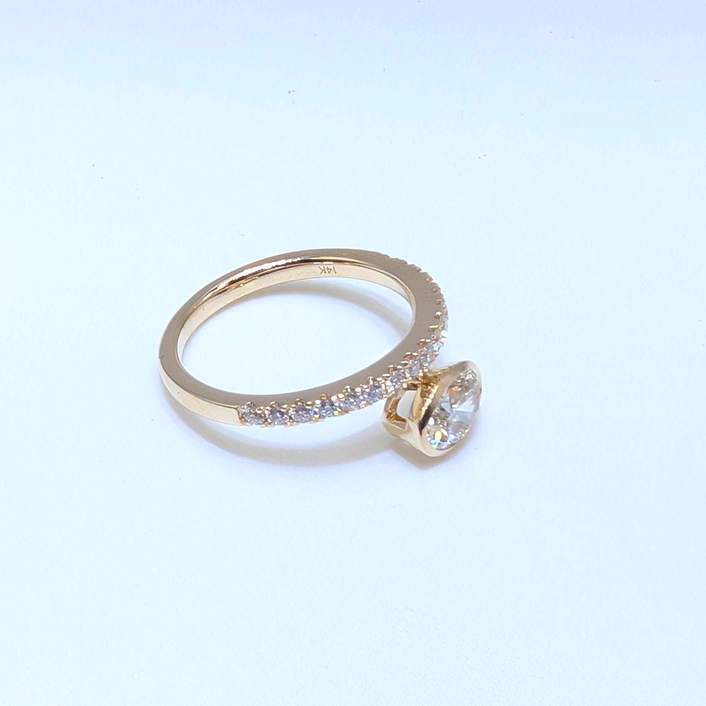 Yellow Gold Diamond Band Ring with Oval Cut Diamond (etsy image id: 6917382974)