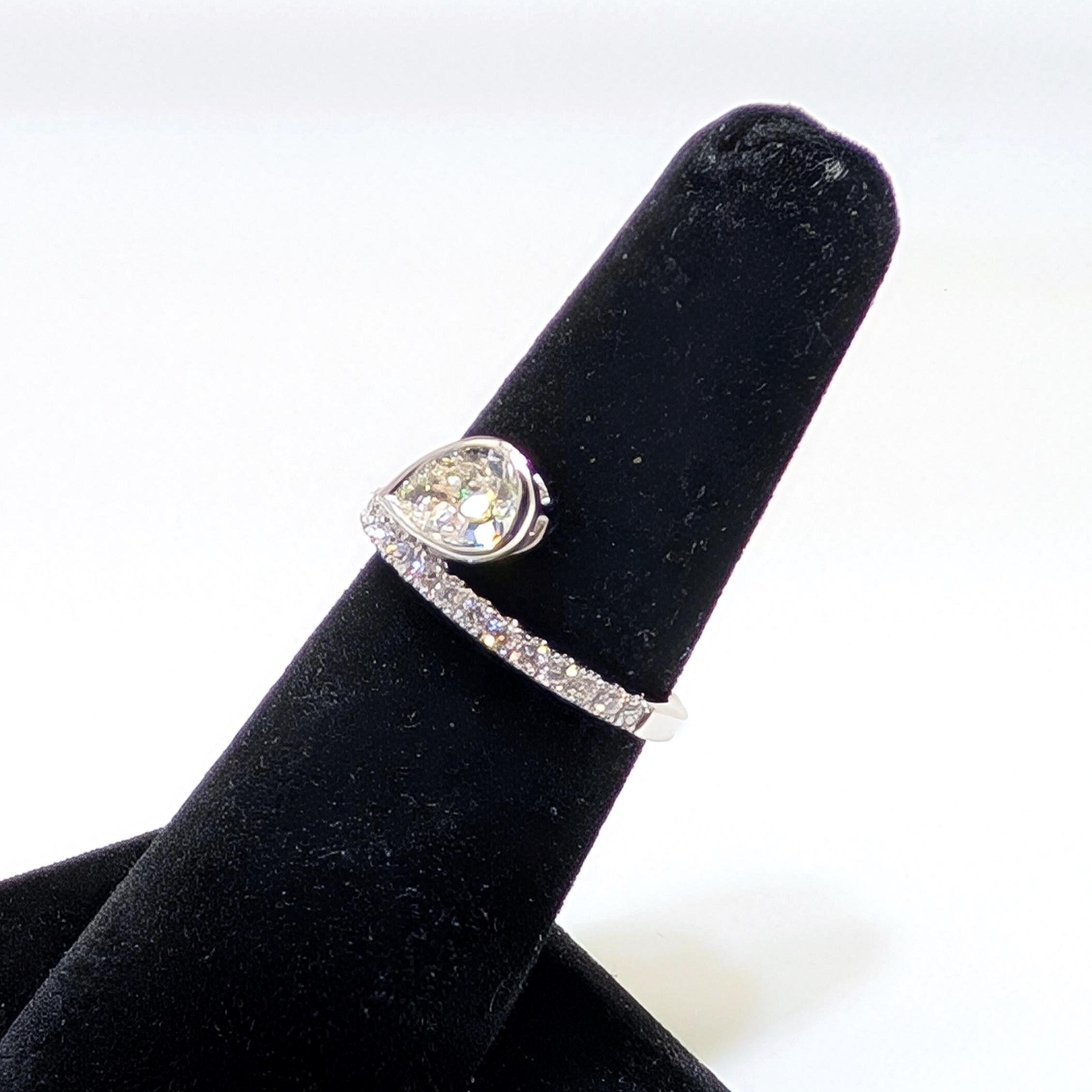 White Gold Half Circle Diamond Band Ring with Pear Shape Diamond in Bezel Setting (etsy image id: 6917689700)