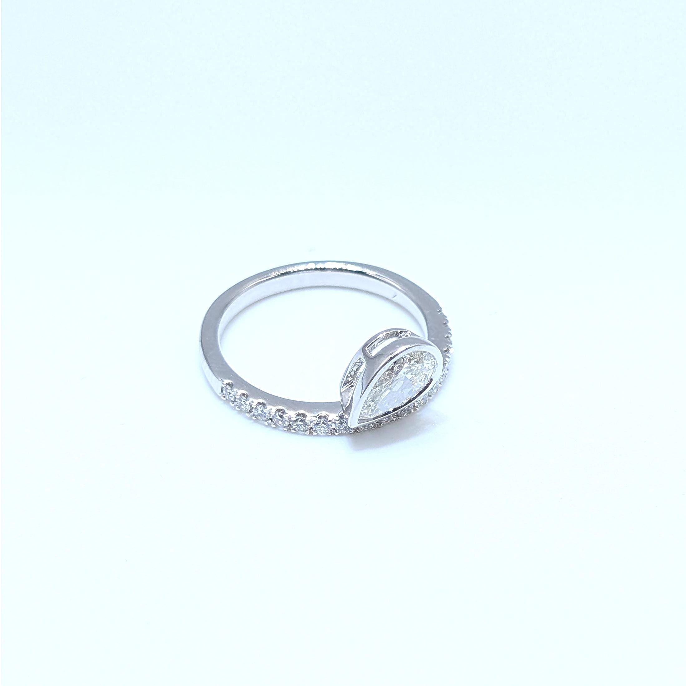 White Gold Half Circle Diamond Band Ring with Pear Shape Diamond in Bezel Setting (etsy image id: 6917692384)
