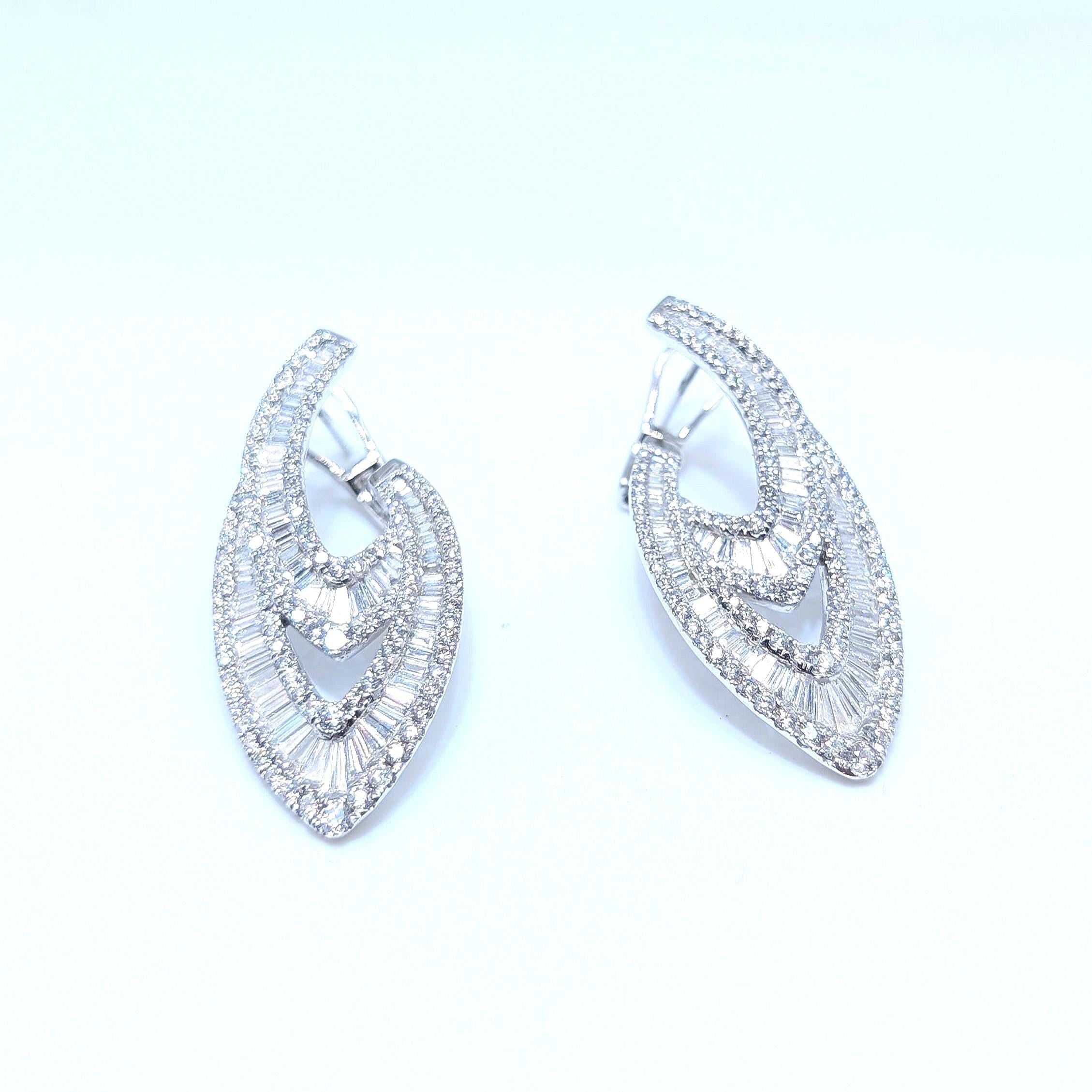 White Gold Dangle Earrings with Baguette and Round Cut Diamonds (etsy image id: 6926624056)