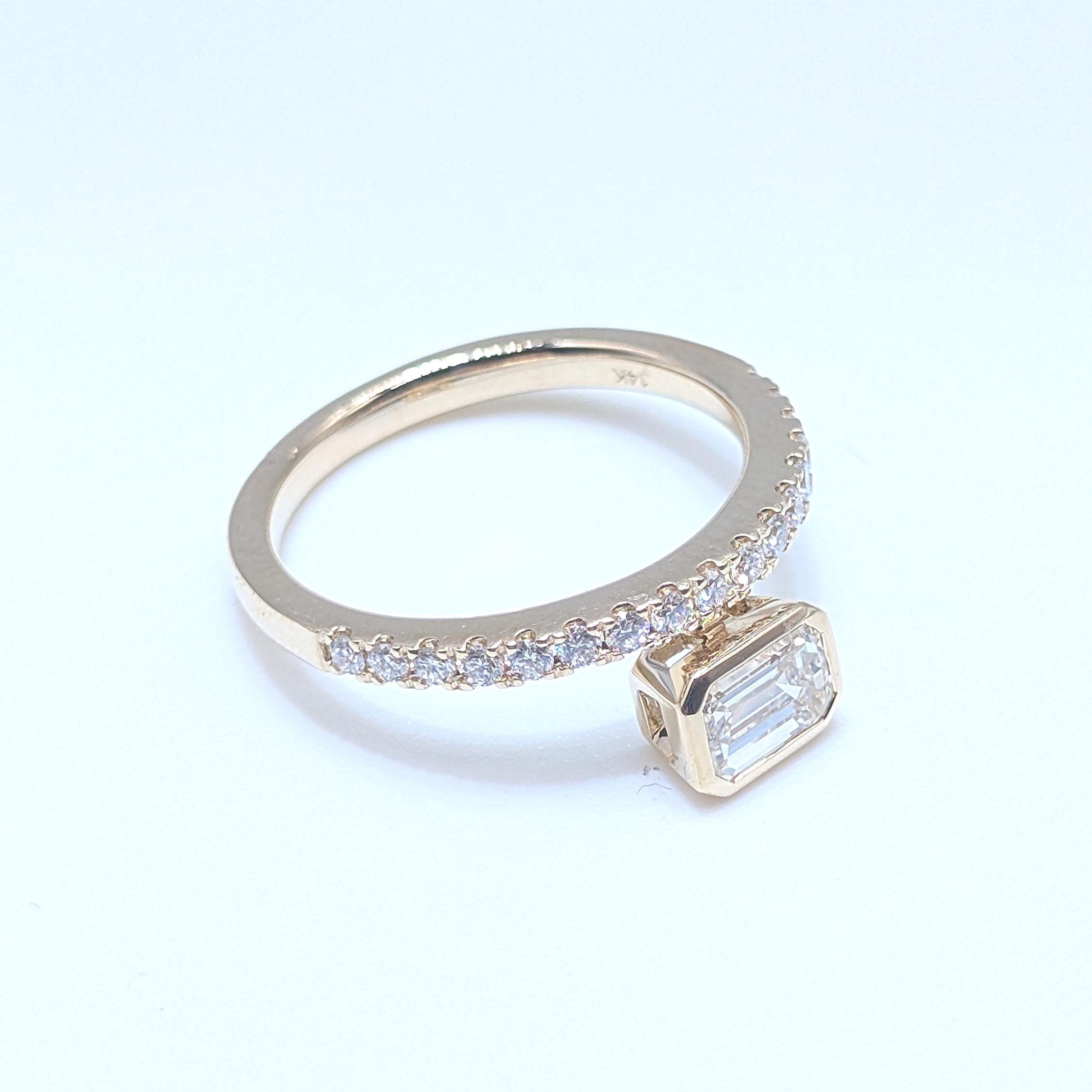 Yellow Gold Band Ring with Half Way Set Round Diamonds and One Emerald Cut Diamond (etsy image id: 6929527536)