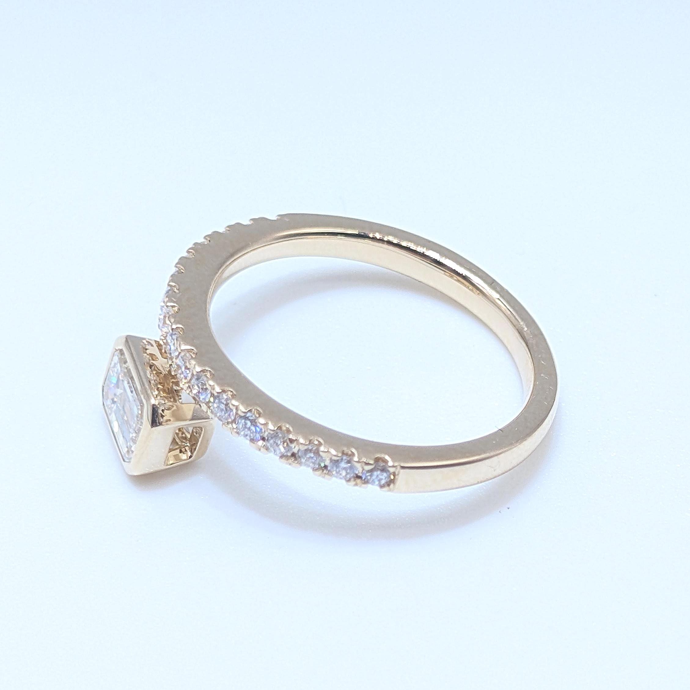 Yellow Gold Band Ring with Half Way Set Round Diamonds and One Emerald Cut Diamond (etsy image id: 6929529726)