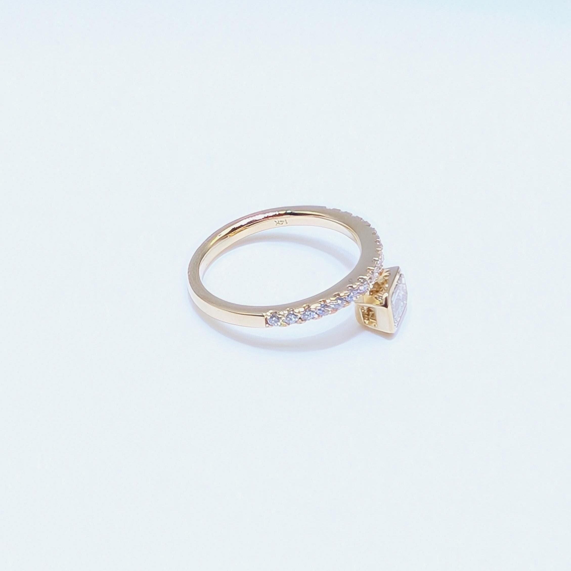 Yellow Gold Band Ring with Half Way Set Round Diamonds and One Emerald Cut Diamond (etsy image id: 6929555322)