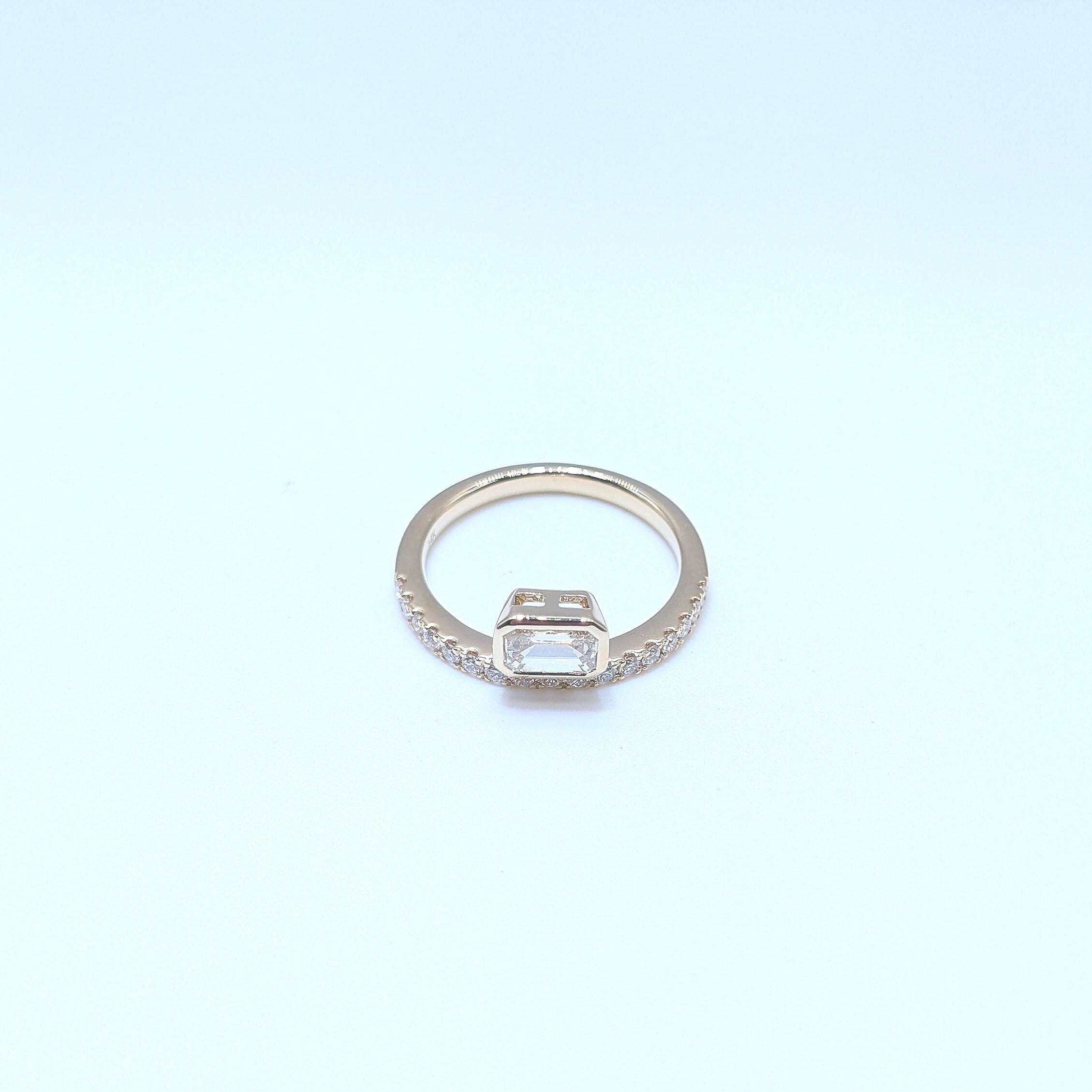 Yellow Gold Band Ring with Half Way Set Round Diamonds and One Emerald Cut Diamond (etsy image id: 6929579682)