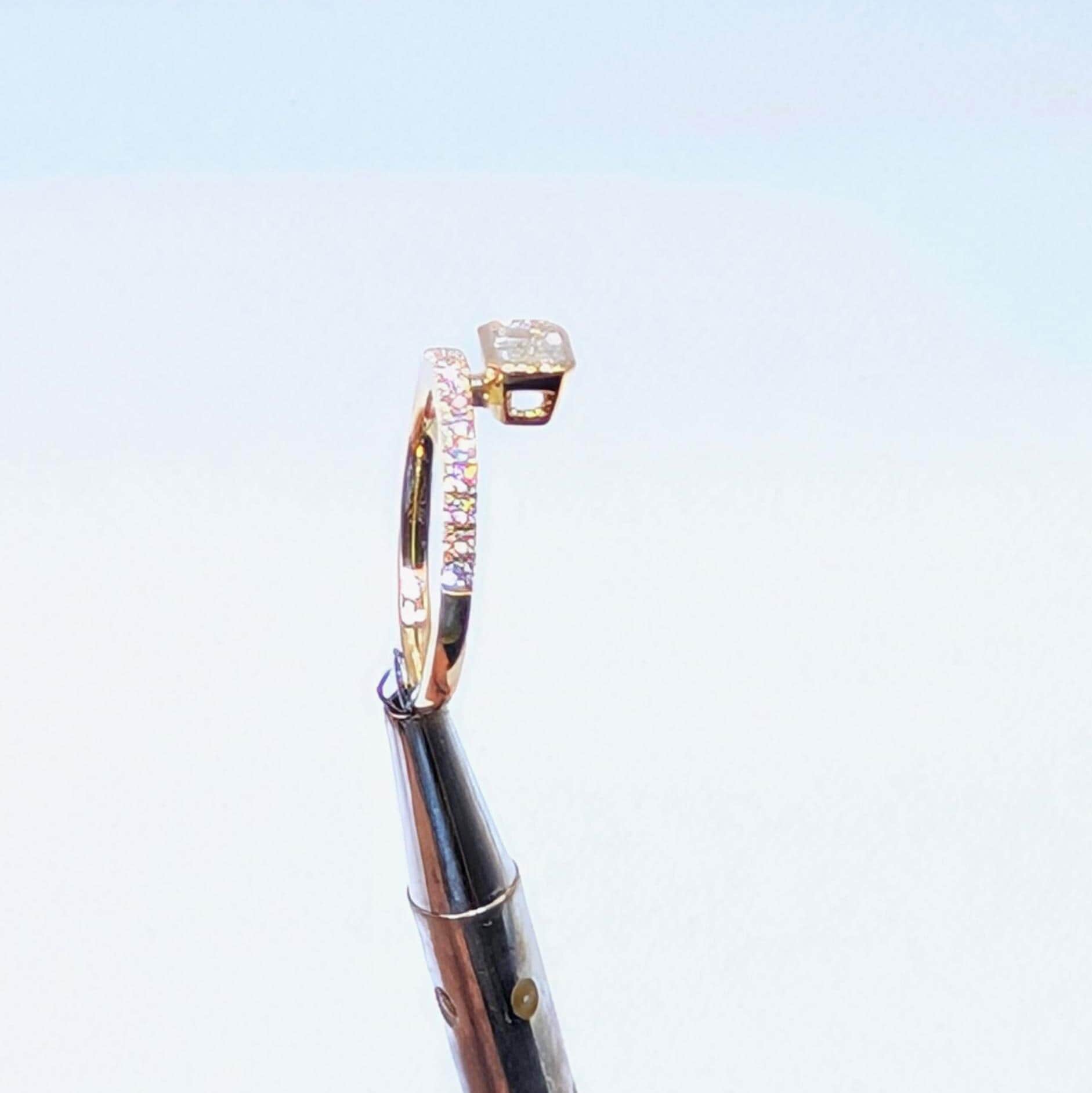 Yellow Gold Band Ring with Half Way Set Round Diamonds and One Emerald Cut Diamond (etsy image id: 6929581614)