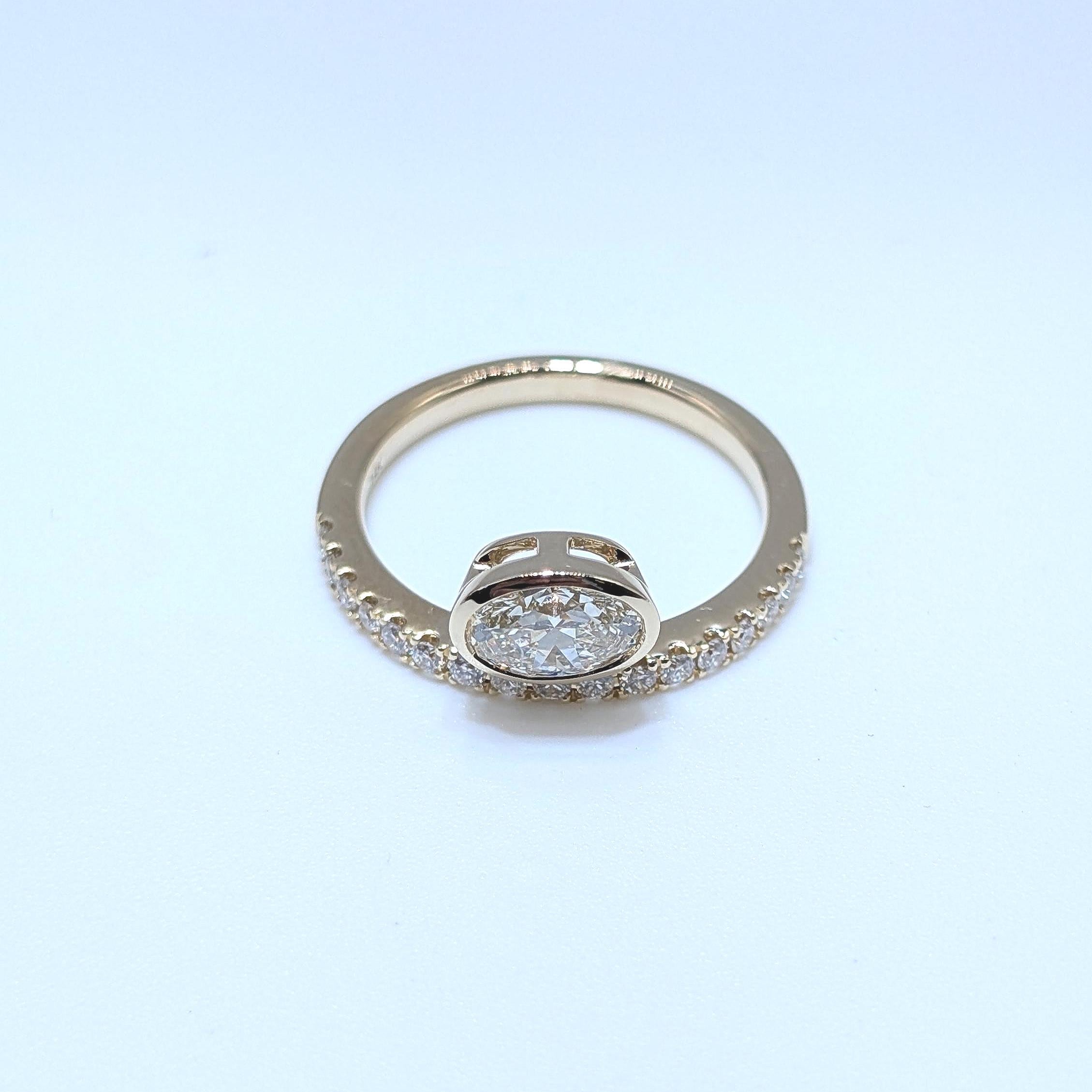 Yellow Gold Diamond Band Ring with Oval Cut Diamond (etsy image id: 6965352725)