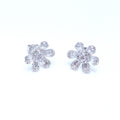 White Gold Flower Shape Diamond Stud Earrings with Baguette and Round Cut Diamonds (etsy image id: 6967251462)