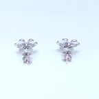White Gold Flower Shape Diamond Stud Earrings with Baguette and Round Cut Diamonds (etsy image id: 7015228405)