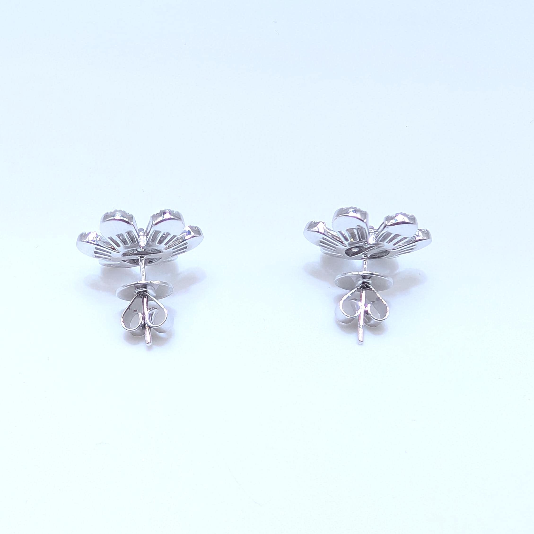 White Gold Flower Shape Diamond Stud Earrings with Baguette and Round Cut Diamonds (etsy image id: 7015228405)