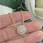 Yellow Gold Single Diamond Pendant Surrounded with a Halo of Diamonds