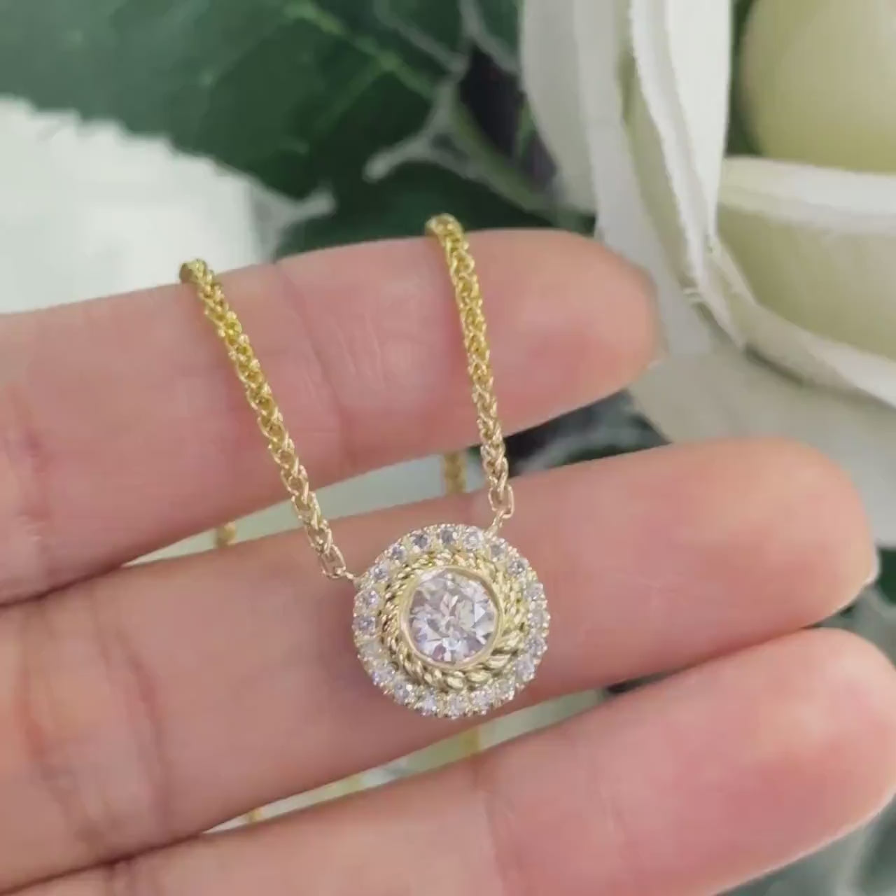 Yellow Gold Single Diamond Pendant Surrounded with a Halo of Diamonds