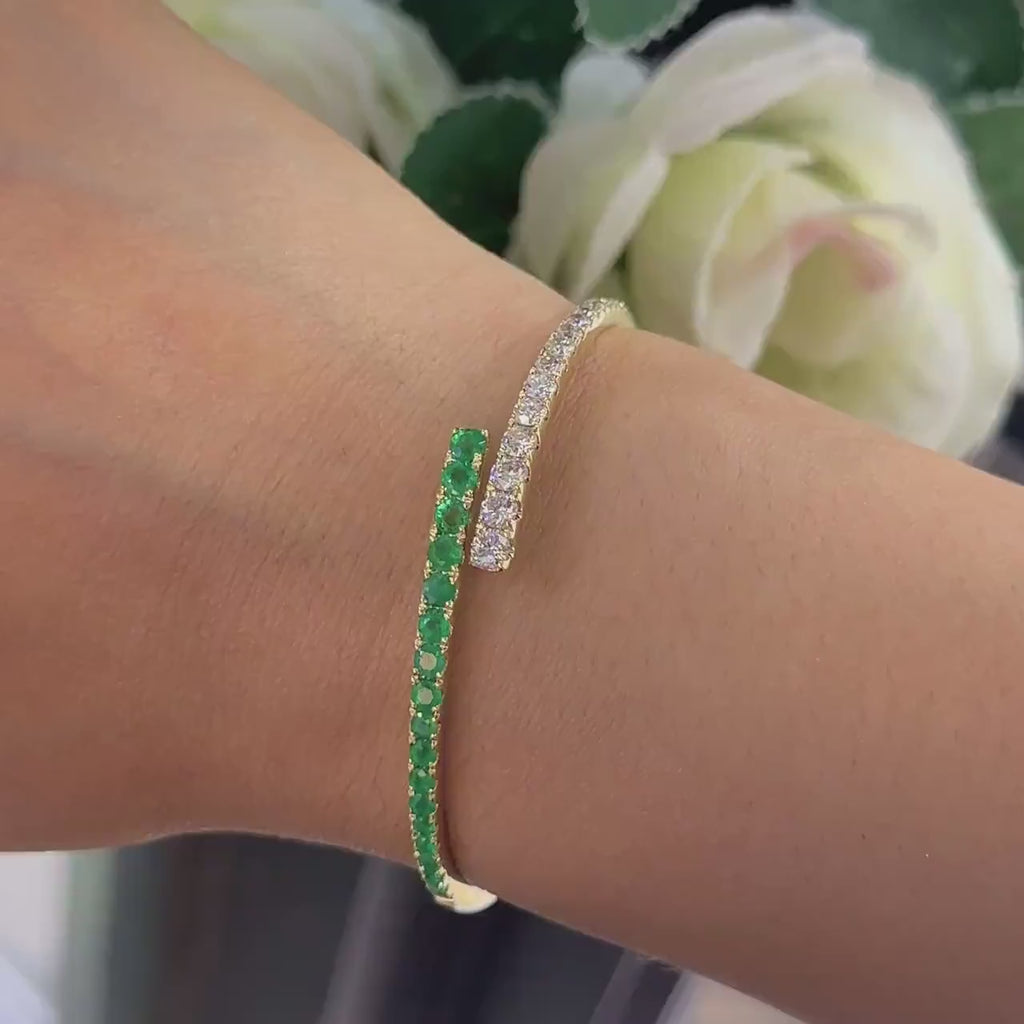 14Kt Yellow Gold Diamond Emerald Bangel bracelet with 1.46ct in Emeralds and 1.48ct rd diamonds .G-H color, VS2 .  GAZT