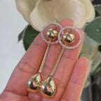 Yellow Gold Elongated Drop Ball Earrings with Natural Diamonds.