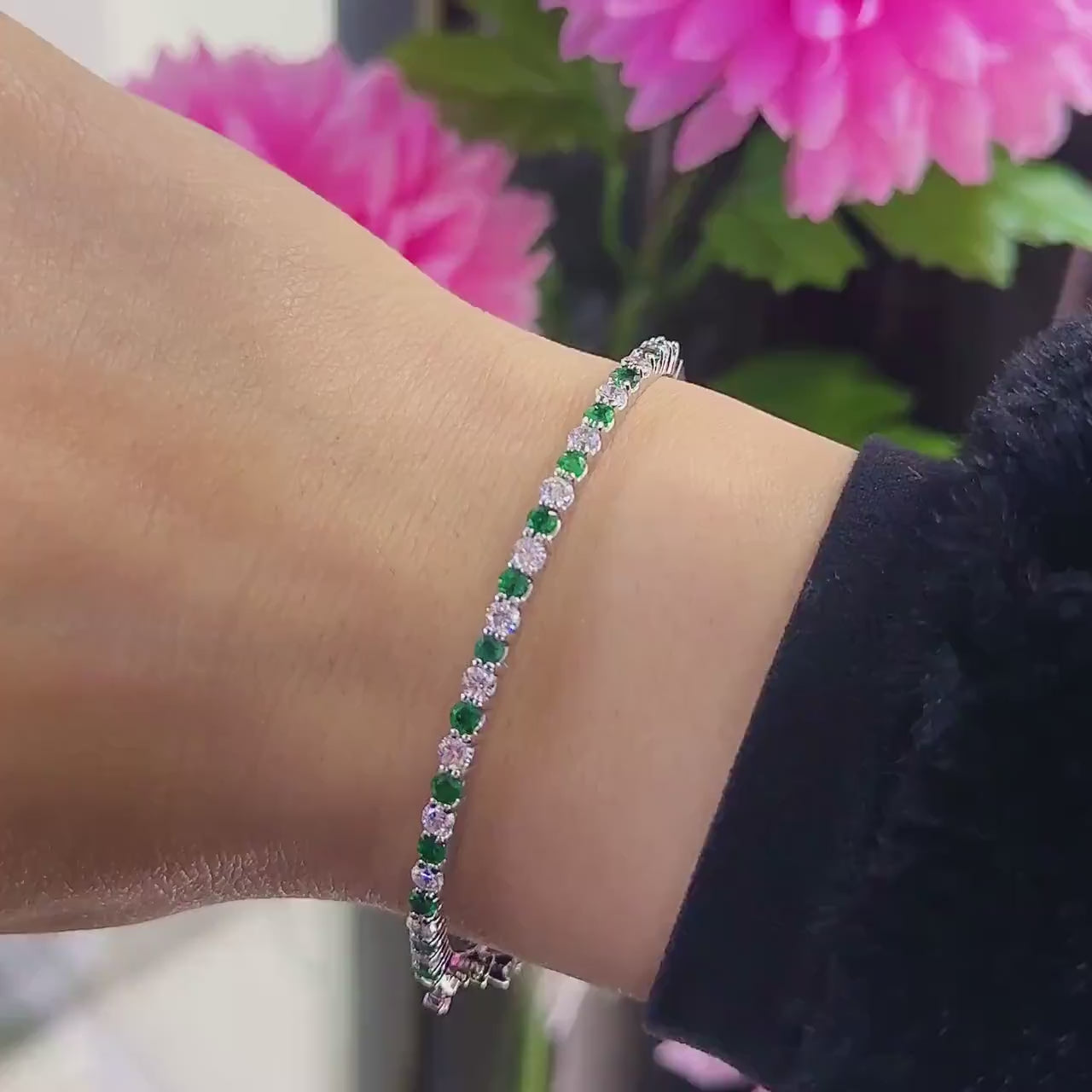Alternating Round Cut Diamond and Round Cut Emerald White Gold Bangle