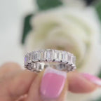 14Kt White Gold eternity band with 6.65ct total in Emerald cut Lab Grown Diamonds. WB588 ISJJ