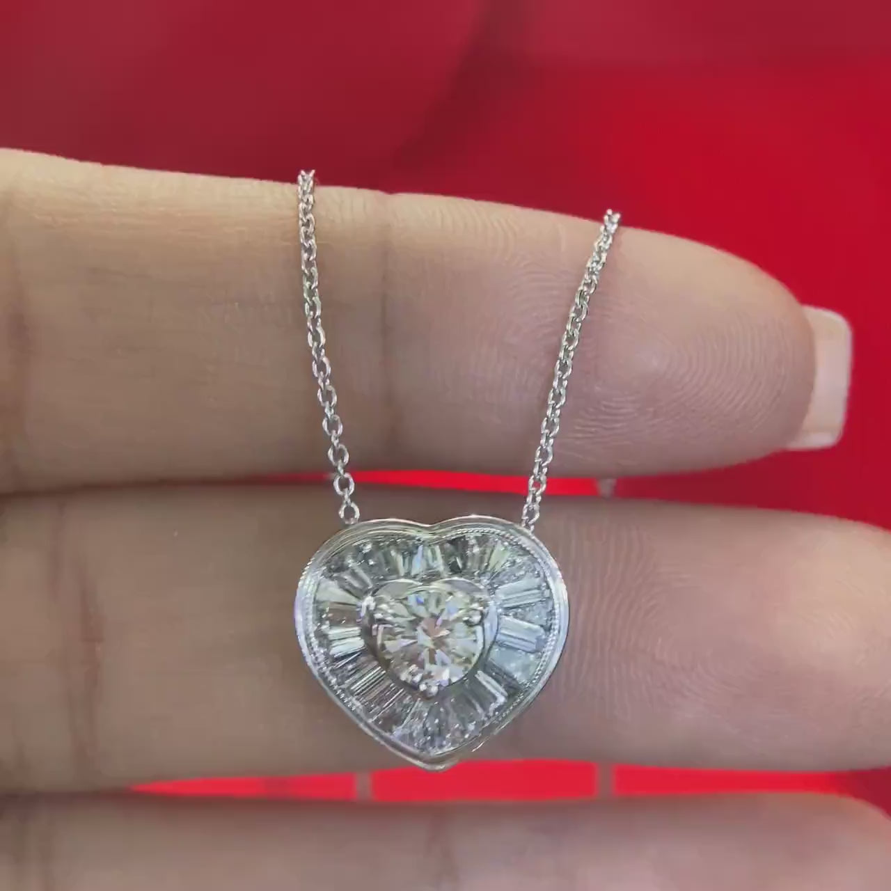 14K White Gold Heart pendant with 0.90ct in Diamonds.