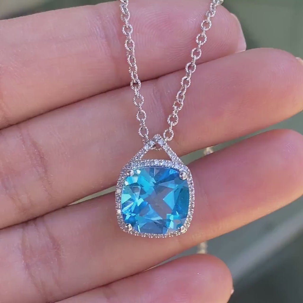 14K White Gold 5.50ct Blue Topaz Pendant in 0.30ct in Diamonds